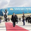 Церемония встречи премьер-министра Фам Минь Тьиня в аэропорту Орли в Париже. (Фото: Зыонг Жанг/ВИА)