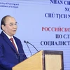 Президент Нгуен Суан Фук выступает на бизнес-семинаре Вьетнам - Россия. (Фото: Тхонг Нят/ВИА)