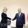 Президент государства Нгуен Суан Фук принимает заместителя председателя "Газпром". (Фото: ВИА)