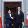 Президент Нгуен Суан Фук и президент Швейцарской Конфедерации Ги Пармелин. (Фото: Тхонг Нят/ВИА)