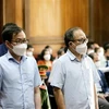 Тат Тхань Канг (справа) и Те Чи Зунг в суде (Фото: ВИА)