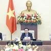 Председатель НС Выонг Динь Хюэ (в центре) на заседании (Фото: ВИА)