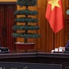 Премьер-министр Фам Минь Тьинь принимает нового посла Новой Зеландии во Вьетнаме Треден Добсон (Фото: ВИА)