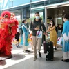 Международные гости приветствуются в международном аэропорту Дананга. (Фото: Чан Ле Лам – ВИА)