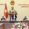 Председатель НС Выонг Динь Хюэ выступает на открытии заседания. (Фото: ВИА)