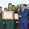 Президент Нгуен Суан Фук присутствовал и вручил Почетные грамоты ученым и-соавторам работ. (Фото: ВИА)
