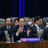 Премьер-министр Фам Минь Тьинь выступает на специальном саммите АСЕАН и США в Вашингтоне, округ Колумбия, 13 мая. (Фото: ВИА) 