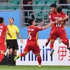 Вьетнамские игроки U23 радуются забитому второму голу. (Фото: ВИА) 