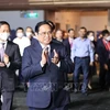 Премьер-министр Фам Минь Тьинь принял участие в 4-м Вьетнамском экономическом форуме. (Фото: Зыонг Жанг/ВИА)
