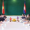 Премьер-министр Фам Минь Тьинь имел встречу с премьер-министром Камбоджи Самдеком Течо Хун Сеном. (Фото: ВИА)