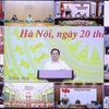 Премьер-министр Фам Минь Тьинь председательствовал на конференции. (Фото: Зыонг Жанг/ВИА)