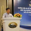 Чу Тханг Чунг, заместитель директора Департамента торговых средств защиты Вьетнама, выступает на семинаре в Хошимине 19 августа. (Фото: ВИА)