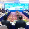 Обзор конференции Куангниня о продвижении инвестиций в 2022 году (Фото: https://baoquangninh.com.vn/) 