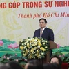 Премьер-министр Фам Минь Тьинь отметил вклад высокопоставленных лиц и представителей религиозных организаций. (Фото: ВИА)