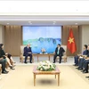 Премьер-министр Фам Минь Тьинь принял г-на Билла Уинтерса, генерального директора банка Standard Chartered. (Фото: Зыонг Жанг/ВИА)