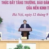 Премьер-министр Фам Минь Тьинь возглавил конференцию по макроэкономической стабильности. (Фото: ВИА)