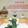 Национальная телеконференция проходит под председательством премьер-министра Фам Минь Тьиня. (Фото: ВИА)