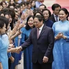 Премьер-министр Фам Минь Тьинь прибывает на конференцию (Фото: Зыонг Жанг/ВИА)