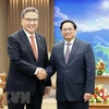 Премьер-министр Фам Минь Тьинь и министр иностранных дел Кореи Пак Джин. (Фото: Зыонг Жанг/ВИА)