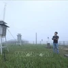 Сбор гидрометеорологических данных на вершине Маушон в Лангшон. (Фото: ВИА)