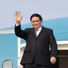 16 декабря премьер-министр Фам Минь Тьинь прибыл в Ханой, успешно завершив визит в страны Европы. (Фото: ВИА)