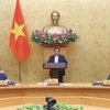 Премьер-министр Фам Минь Тьинь выступает на заседании (Фото: ВИА) 