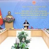 Премьер-министр Фам Минь Тьинь поздравил ветеранов Народных сил общественной безопасности. (Фото: ВИА)