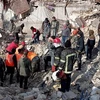 Поисково-спасательные силы работают над поиском жертв землетрясения в Аль-Машарка, Алеппо, север Сирии, 7 февраля 2023 года. (Фото: Синьхуа/ВИА) 