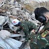 Аварийно-спасательные силы ВНА начали поиск и оказание помощи пострадавшим от землетрясения в провинции Хатай, Турция. (Фото: Ван Хиеу/ВИА)