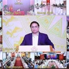 Премьер-министр Фам Минь Тьинь возглавил общенациональную онлайн-конференцию, посвященную вопросам ускорения выделения и освоения государственного инвестиционного капитала в 2023 году. (Фото: ВИА) 