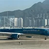 Самолет Vietnam Airlines в международном аэропорту Гонконга в Гонконге (Китай). (Фото: ВИА) 