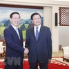 Генеральный секретарь, президент Лаоса Тонглун Сисулит принял президента Во Ван Тхыонга (слева), когда он был постоянным членом Секретариата ЦК КПВ в июле 2022 года. (Фото: ВИА)