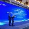 Министр Нгуен Хонг Зиен выступает на Вьетнамско-китайской конференции по содействию торговле, инвестициям и экономическому сотрудничеству в Хайнане. (Фото: moit.gov.vn)