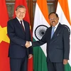 Министр То Лам (слева) и советник по национальной безопасности Индии Аджит Кумар Довал. (Фото: bocongan.gov.vn)