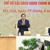 Премьер-министр Фам Минь Тьинь председательствовал на четвертом заседании правительственного комитета по административной реформе. (Фото: ВИА)