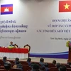 На 12-й конференции по сотрудничеству и развитию между приграничными провинциями Вьетнама и Камбоджи. (Фото: ВИА) 