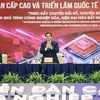 Премьер-министр Фам Минь Тьинь на пленарном заседании Форума высокого уровня и Международной выставки «Индустрия 4.0» в 2023 году. (Фото: Зыонг Жанг/ВИА)