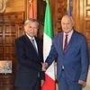 Министр общественной безопасности То Лам встречается с министром юстиции Италии Карло Нордио. (Фото: ВИА)