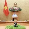 Премьер-министр Фам Минь Тьинь председательствовал на очередном заседании правительства в июле 2023 года. (Фото: Зыонг Жанг/ВИА)