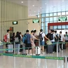 Иностранные граждане въезжают во Вьетнам по электронной визе через международный пограничный пропускной пункт Хыунги (Лангшон). (Фото: ВИА)