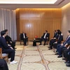 Встреча премьер-министра Фам Мин Тьиня (справа) с руководителями крупных индонезийских предприятий в Джакарте 4 сентября. (Фото: ВИA)