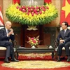 Президент Во Ван Тхыонг принимает президента США Джо Байдена. (Фото: Тхонг Нят/ВИА)