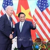 Премьер-министр Фам Минь Тьинь на встрече с президентом США Джо Байденом. (Фото: Зыонг Жанг/ВИА)