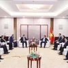 Премьер-министр Фам Минь Тьинь принял руководителей китайских корпораций в сферах технологий, энергетики и инфраструктуры. (Фото: Зыонг Жанг/ВИА)