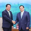 Премьер-министр Фам Минь Тьинь принял мэра Вьентьяна (Лаос) Ацапхангтонга Сифандоне. (Фото: Зыонг Жанг/ВИА)