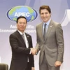 Президент Канады Во Ван Тхыонг (слева) и премьер-министр Канады Джастин Трюдо (Фото: ВИA)