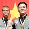 Чан Кьет Чиен (слева) и Бао Фыонг Винь выигрывают чемпионат мира среди сборных с тремя подушками в начале 25 марта. ((Фото: Бильярд 1)