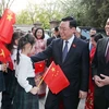 Председатель НС встречается с представителями вьетнамской общиной в Китае. (Фото: ВИА)