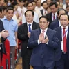 Премьер-министр Фам Минь Тьинь принял участие в открытии нового учебного года в национальном университете города Хошимин 16 ноября. (Фото: ВИA)