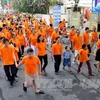 近8000人参加为橙毒剂受害者步行活动